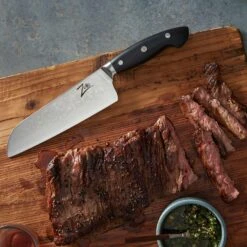 Executive-Plus Serie 7" Santokumesser 61 HRC Damaszenerstahl 12 Executive-Plus Serie 7" Santokumesser 61 HRC Damaszenerstahl -Geschäft Für Haushalts- Und Küchenbedarf 10039011 de 0005 logo