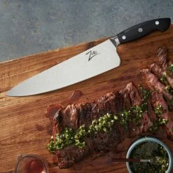 Executive-Plus Serie 10" Kochmesser 61 HRC Damaszenerstahl -Geschäft Für Haushalts- Und Küchenbedarf 10039013 de 0003 logo